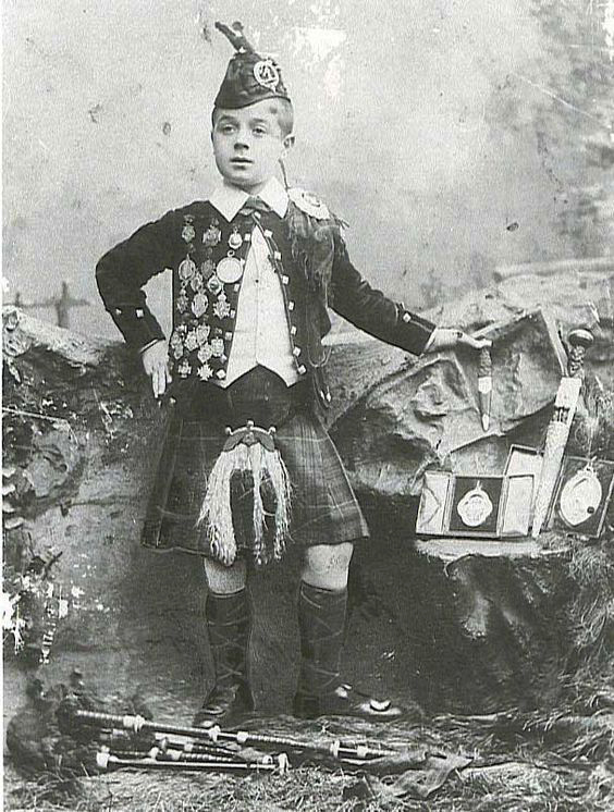 Photo of photos/G S McLennan aged 10 just aftr perf for Q Victoria